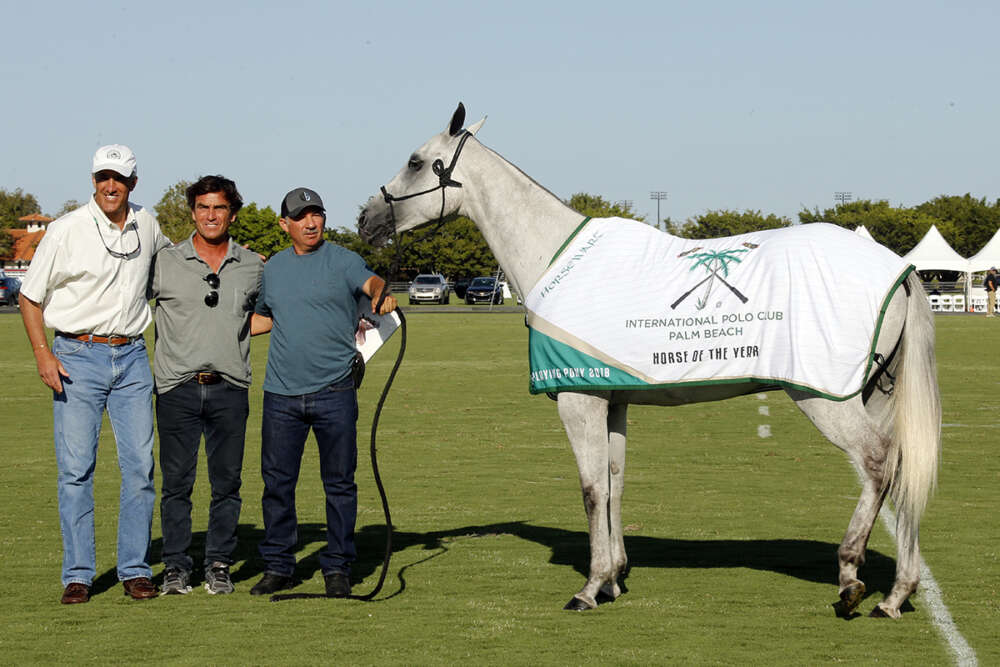 International Polo Club Horse of the Year: Macarena, owned and played by Mariano Gonzalez, presented by USPA Chairman Chip Campbell, pictured with Lalo Ugarte. 