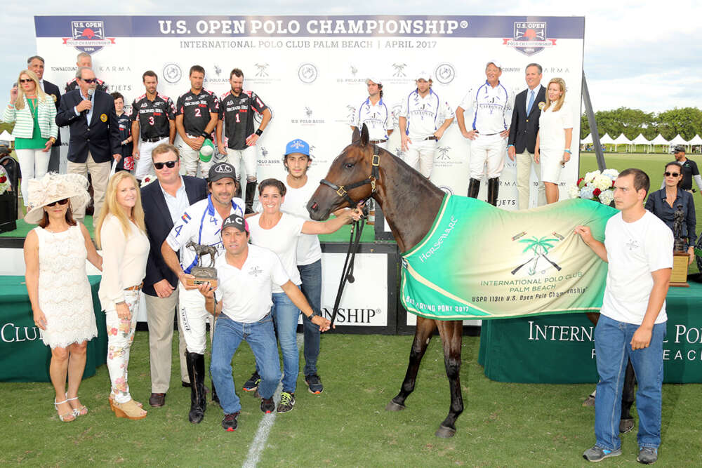 The Willis L. Hartman Trophy for Best Playing Pony of the 2017 U.S. Open Polo Championship® Final: B09, played and owned by Adolfo Cambiaso (L to R: Brenda Lynn, Marci Puetz, Steven Orthwein Jr., Adolfo Cambiaso, Gustavo Gomez, Gloria D'Angelo, Carlos Cellis, Andres Luna).