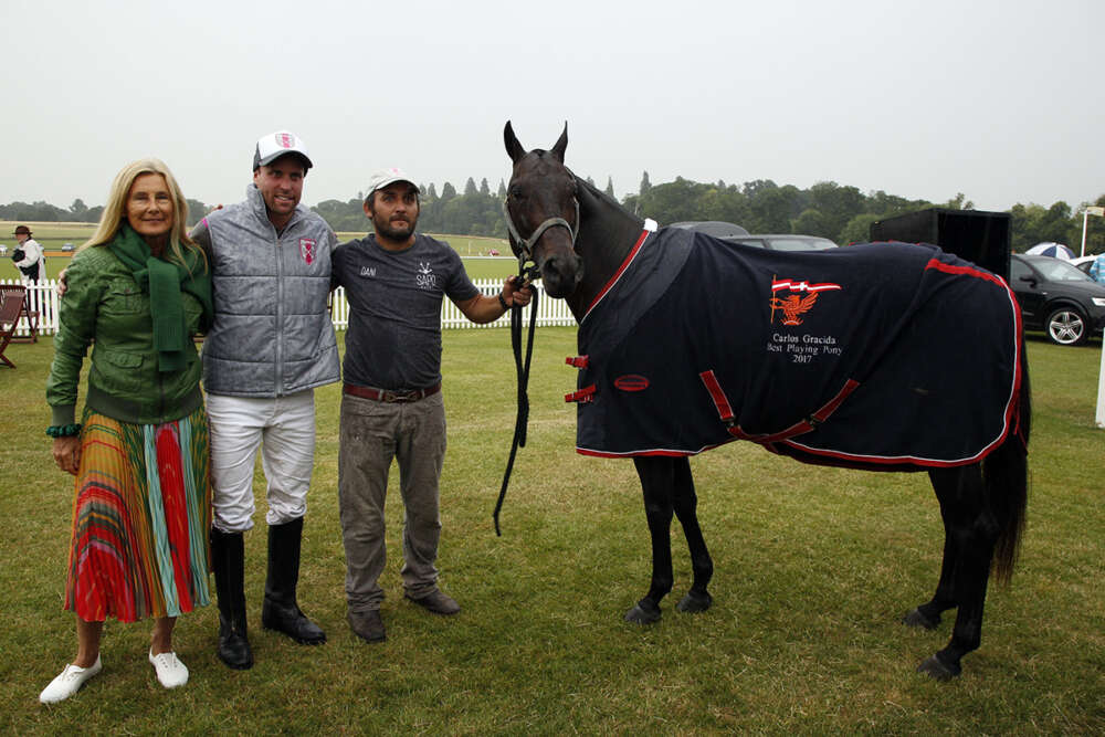 Popular received Best Playing Pony in the Carlos Gracida Memorial Trophy which is traditionally played on the opening day of the Gold Cup at Cowdray Park Polo Club in England. The prize was presented by The Honorable Lila Pearson, Vice President of Cowdray Park Polo Club. ©Clive Bennett