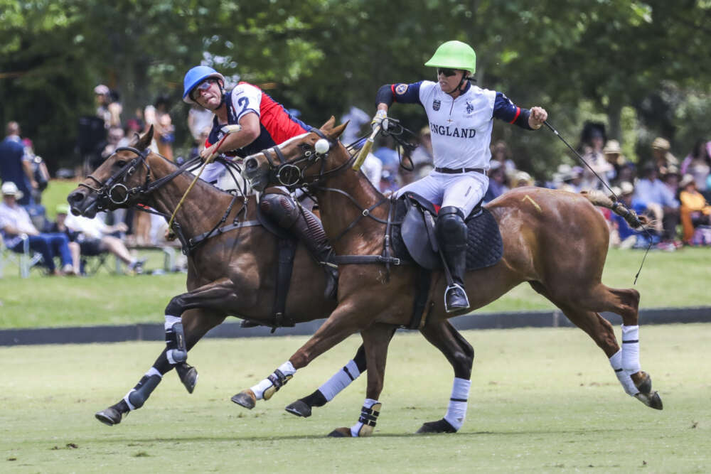 Jesse Bray with a gorgeous neckshot to goal as England hustles to defend. 