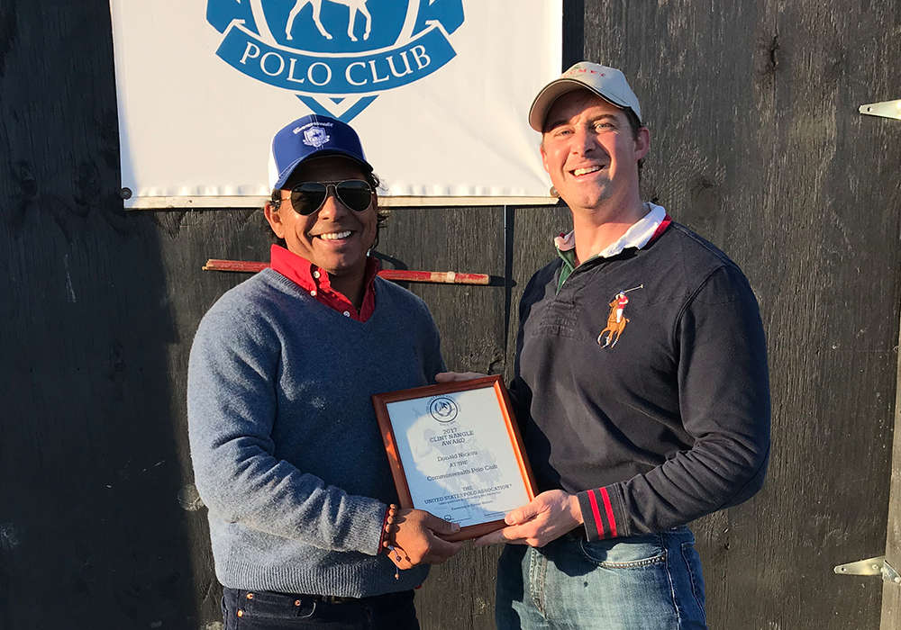 Jorge Vasquez presenting the 2017 Clint Nangle Equine Welfare Award to Donald Nickou.