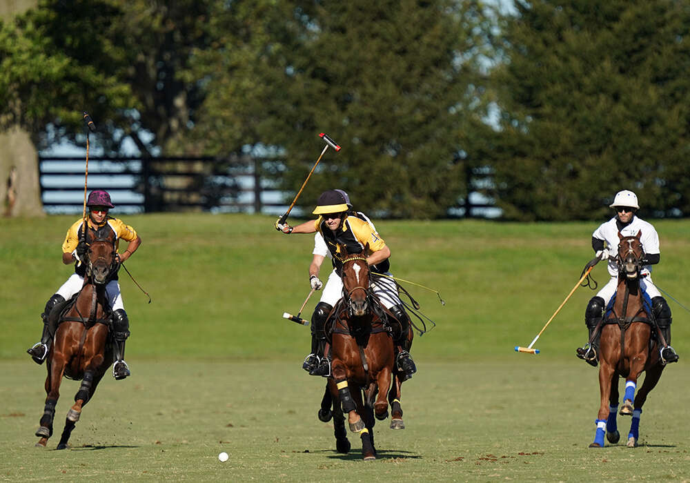 Competition in the 14-goal Kentucky Cup final at Mt. Brilliant Polo LLC. ©Mathea Kelley