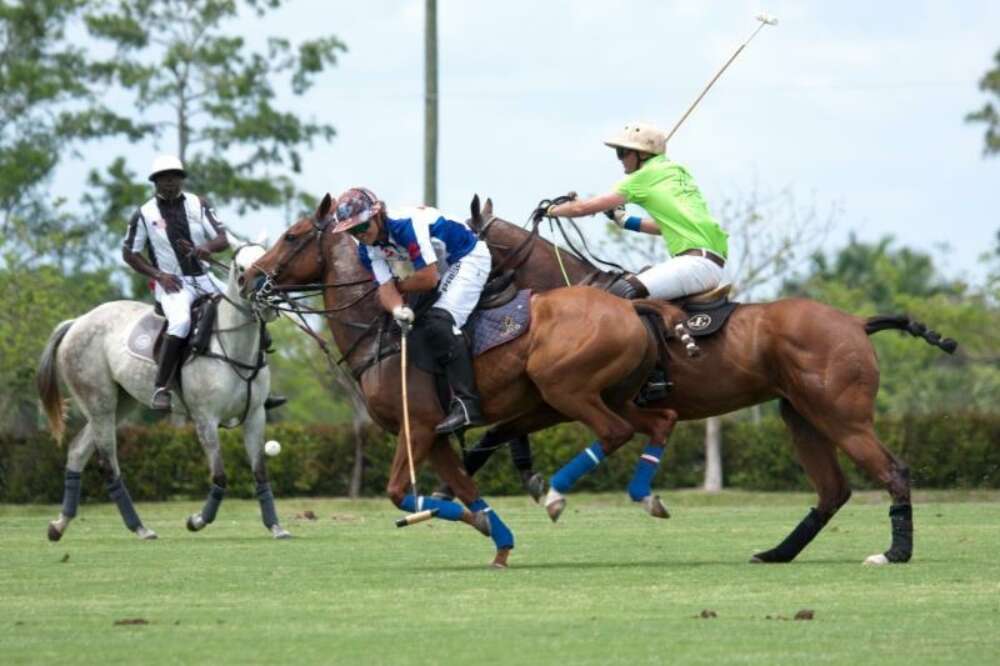 Lucas Diaz Alberdi of Sebucan works near side with Julio Gracida of ChukkerTV defending.