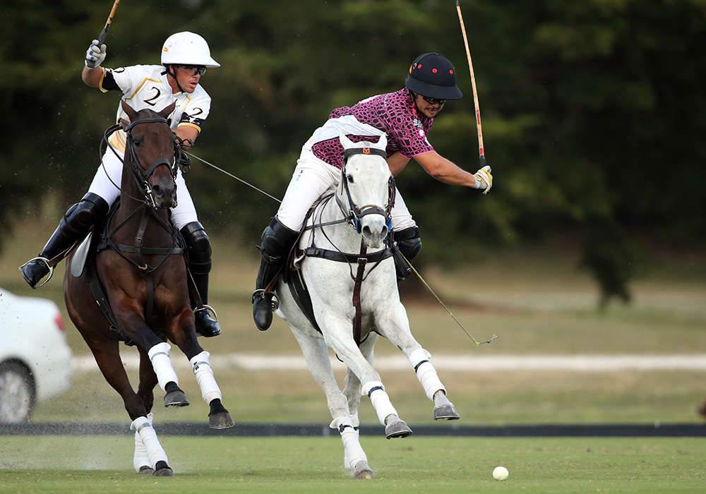 Lucas Diaz Alberdi playing the ball on the nearside against Palm Beach Equine's Robbie Bilbao.