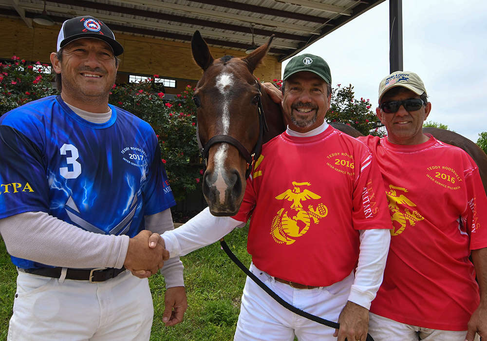 Best Playing Pony, Mina Pud pictured with Pud Nieto, Fabian Vela, and Lalo Ramirez.