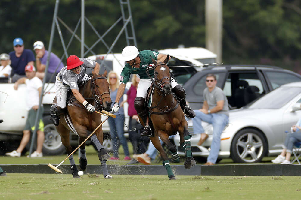 La Indiana's Facundo Obregon hooks Tonkawa's Julian de Lusarreta. 