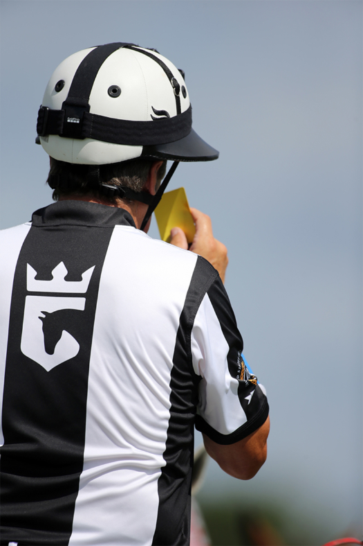 Variance to Outdoor Rule 33 allows the Umpires to issue three yellow cards for post-game misconduct. ©David Lominska